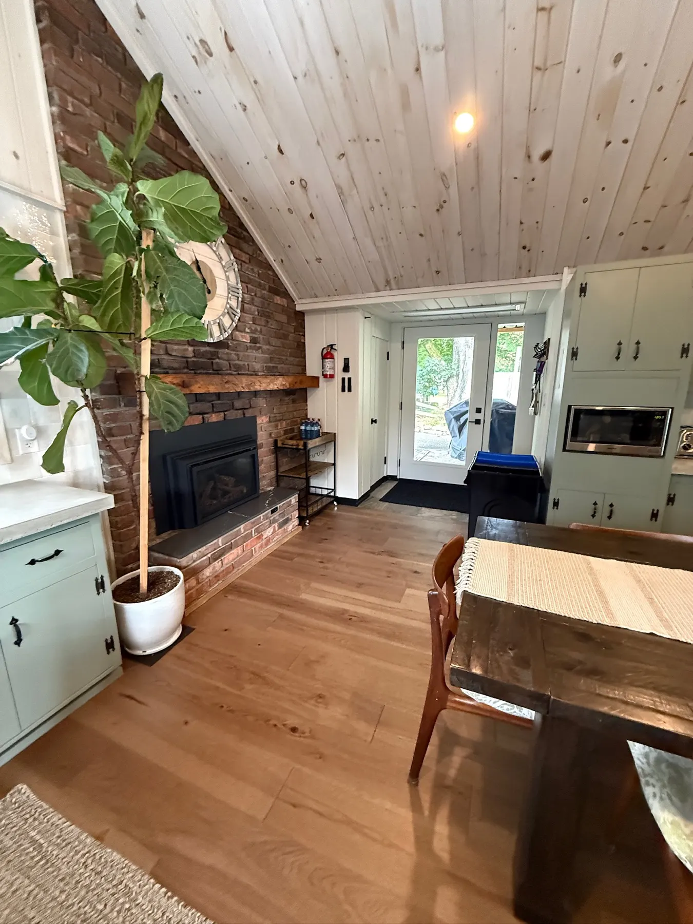 Haliburton Cottage, fireplace and side entry after the renovation